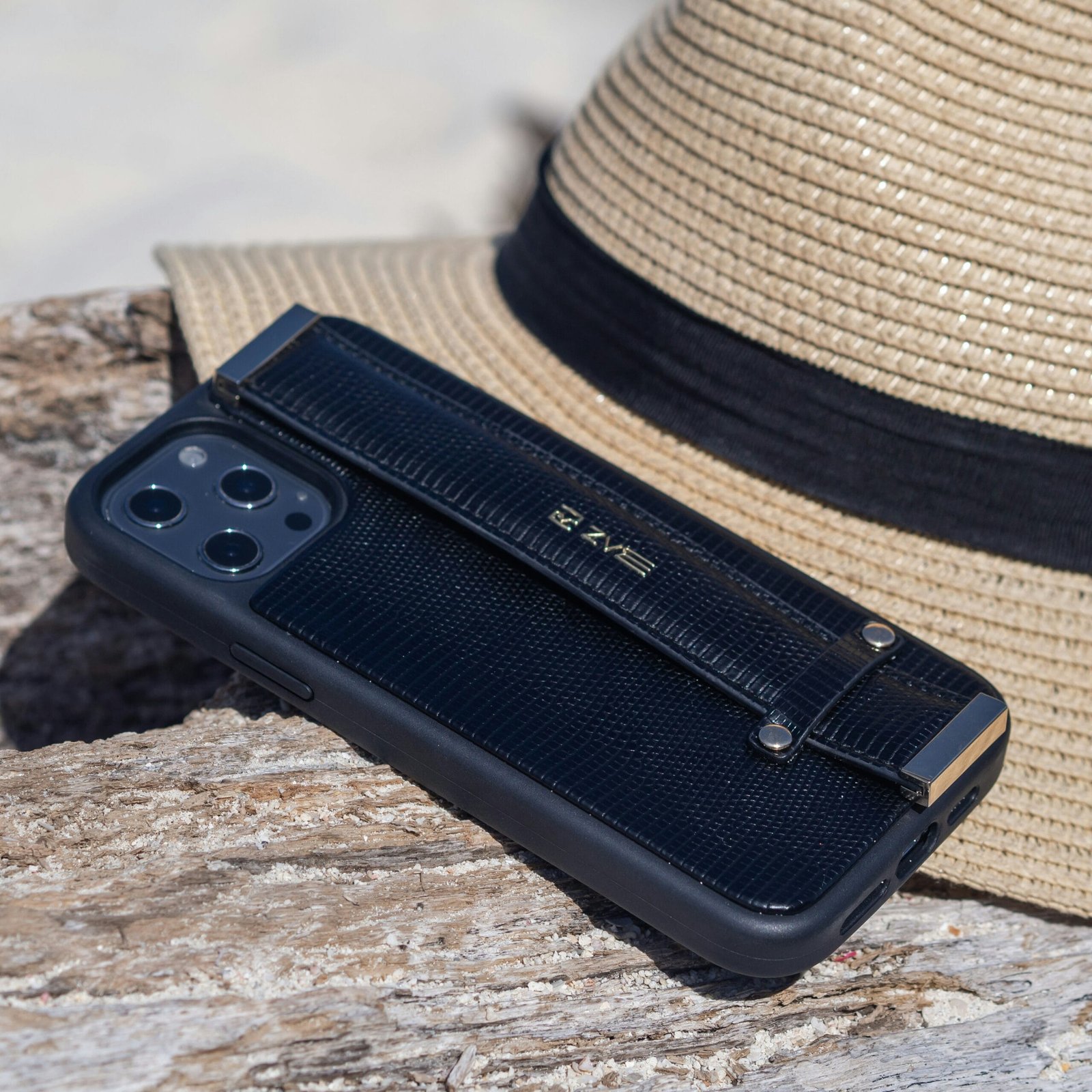 a cell phone sitting on top of a wooden table